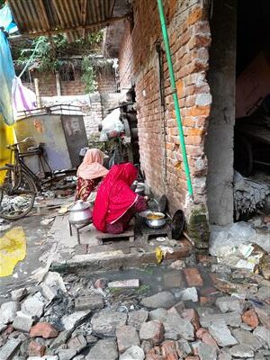 Aadya in the cooking space that is shared by 35 families