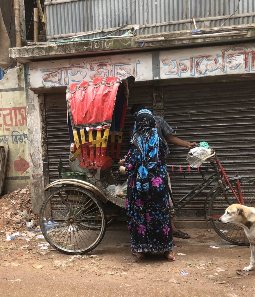 Rina’s father collects her from work by rickshaw