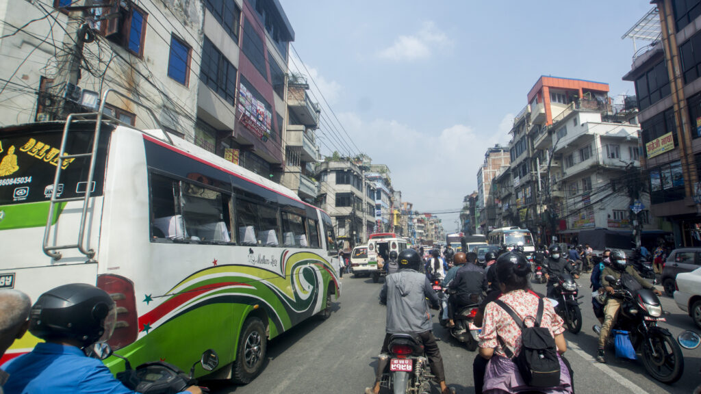 Travelling across the city on a motorcycle taxi