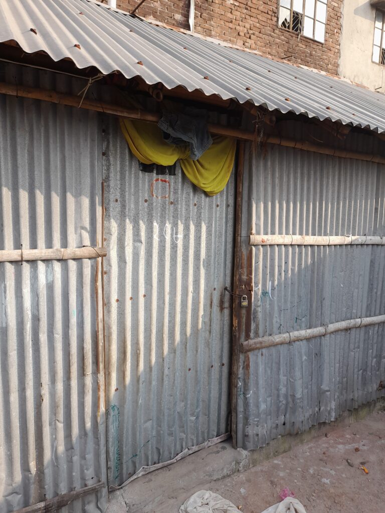 The exterior of one of the buildings that children such as Aftab live in