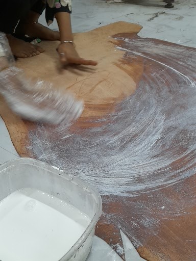 Putting latex on leather