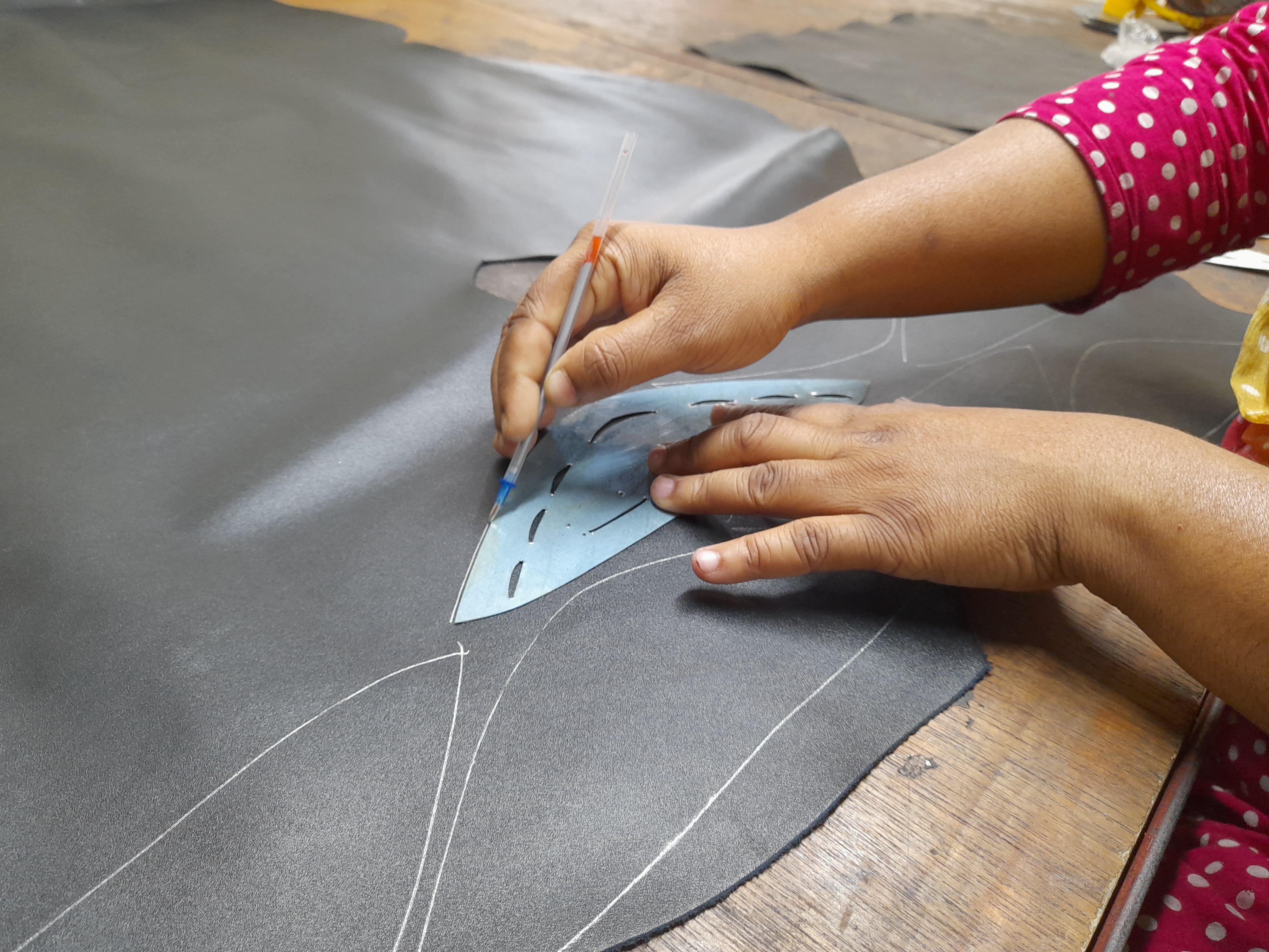 Marking up where the leather will be cut