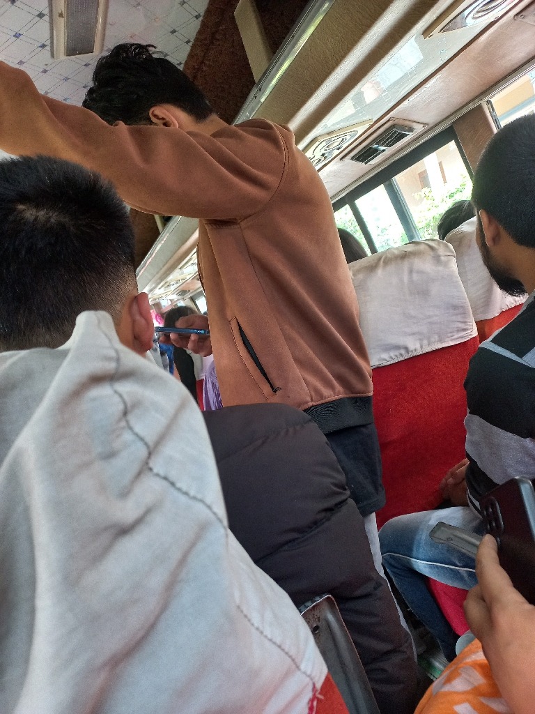 Inside a crowded bus